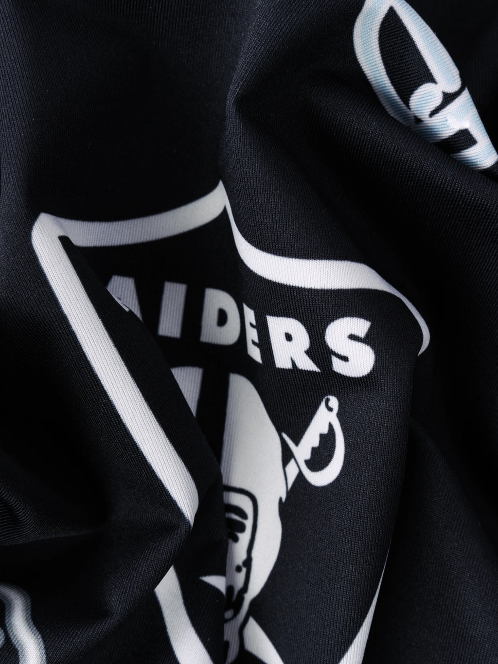 The Neon Raiders (NFL Performance Polo)
